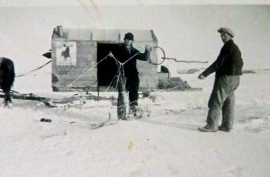 Dad with Caboose Ice Fishing