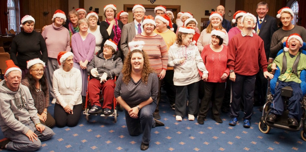 Adults-with-learning-disabilities-sing-Merry-Christmas-to-County-Councillors