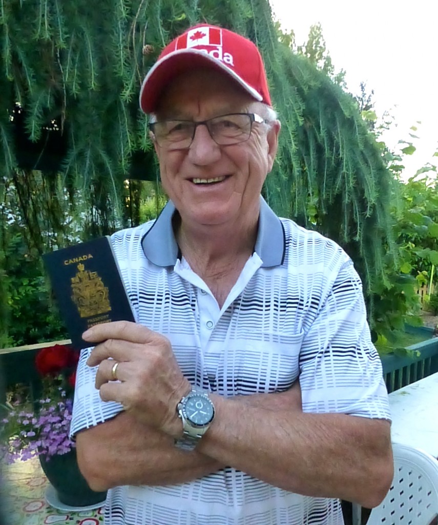 Harold holding new Canadian Passport